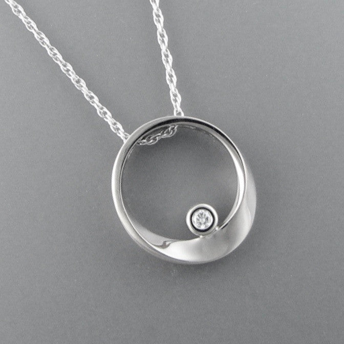 Möbius Pendant with diamond in Sterling Silver