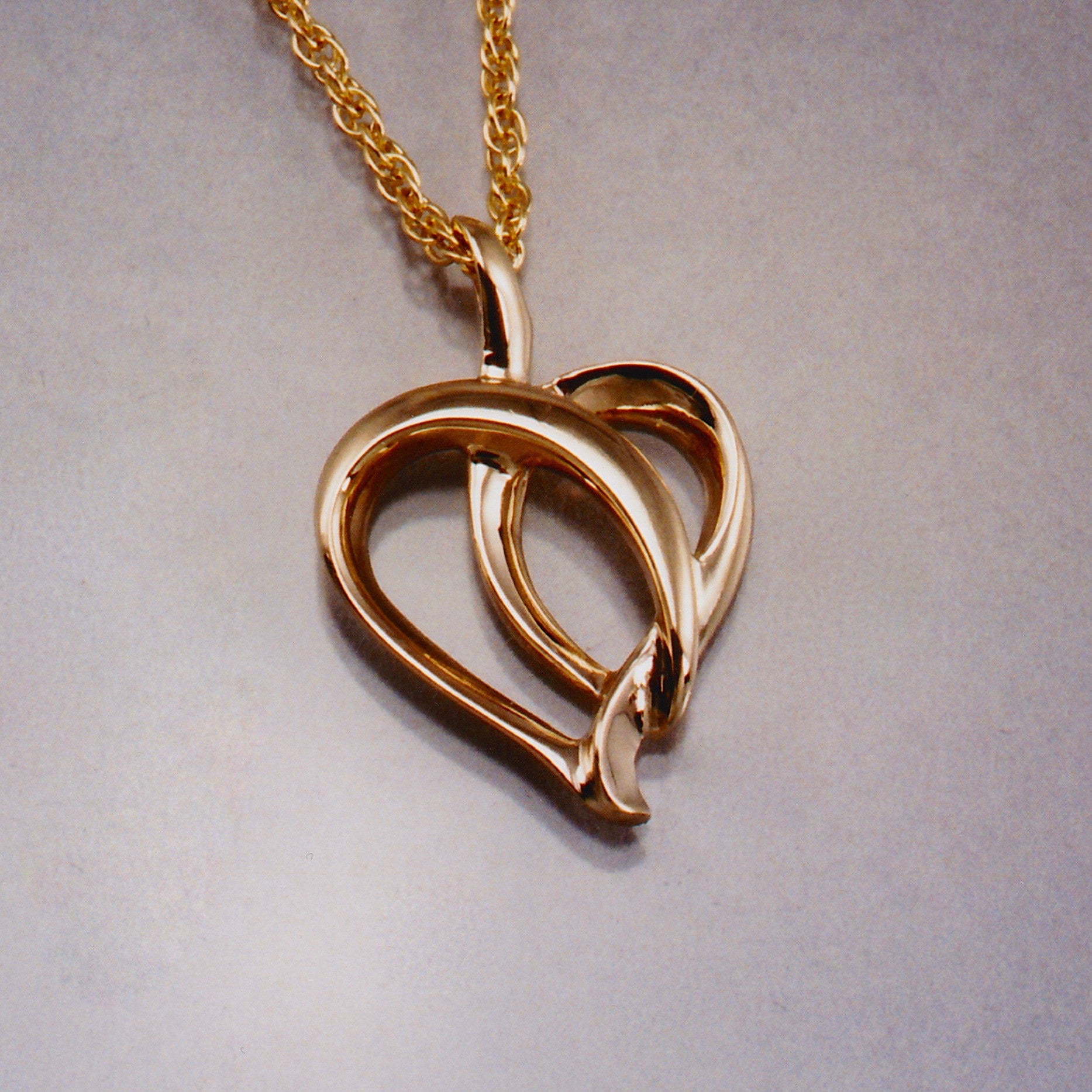 Ribbon Light Heart Pendant,Custom,custom jewelry designer,custom jewelry design, Handmade jewelry, handcrafted, fine jewelry designs, designer goldsmiths, unique jewelry designs, northwest jewelry, northwest jewelry designers, pacific northwest jewelry,