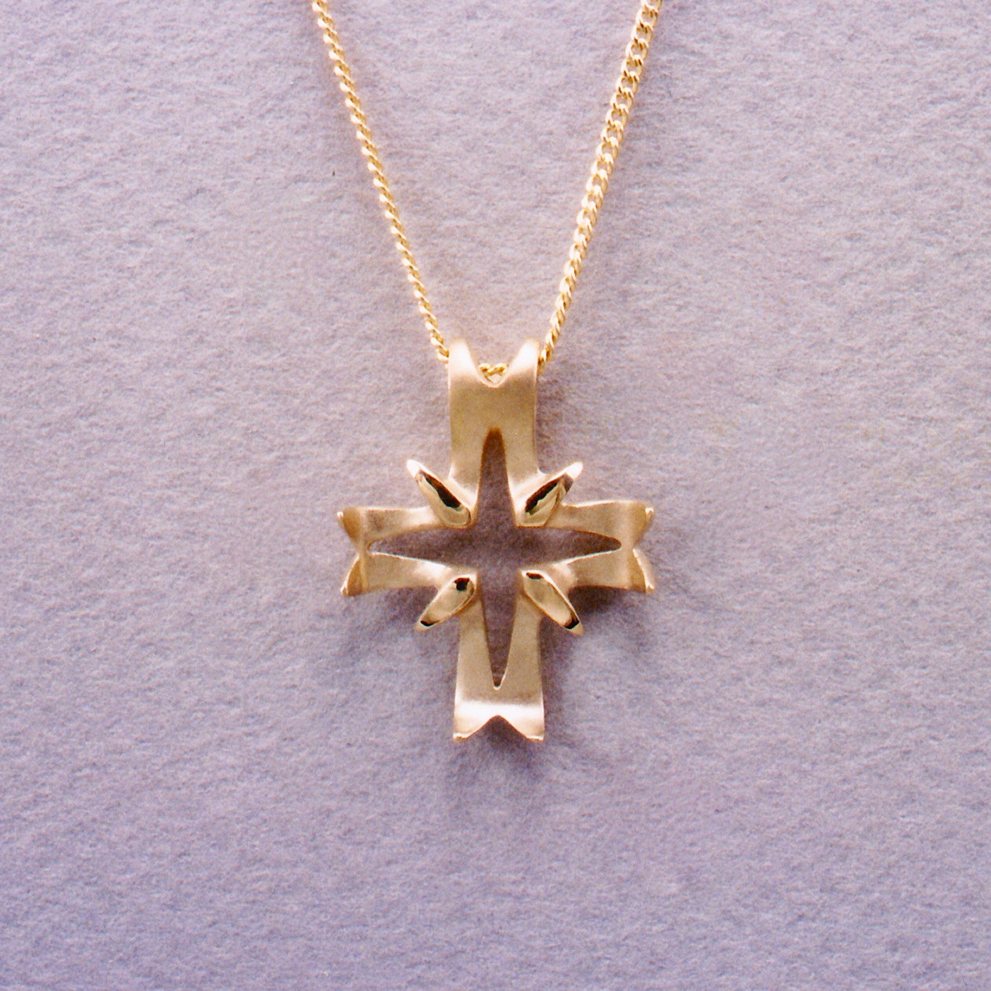 Bethlehem Star Cross,Custom,custom jewelry designer,custom jewelry design, Handmade jewelry, handcrafted, fine jewelry designs, designer goldsmiths, unique jewelry designs, northwest jewelry, northwest jewelry designers, pacific northwest jewelry,